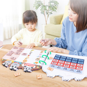 Child Pasting Book